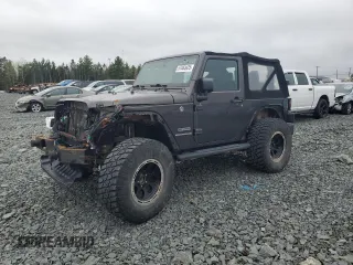 2017 Jeep Wrangler Sport z VIN 1C4AJWAG4HL650105, wystawiony jako Copart lot #57465425 z przebiegiem 85 821 mil mil oraz Szkoda całkowita • Salvage title. Historia ofert i sprzedaży dostępna na DreamBid. Obrazek 1.