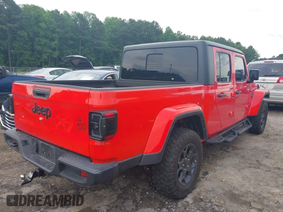 2023 Jeep Gladiator Sport S z VIN 1C6HJTAG4PL544871, wystawiony jako IAAI lot #42382428 z przebiegiem 33 453 mil mil oraz . Historia ofert i sprzedaży dostępna na DreamBid. Obrazek 4.