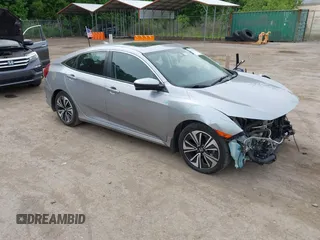 2016 Honda Civic EX-L z VIN 2HGFC1F71GH636929, wystawiony jako IAAI lot #42253766 z przebiegiem 123 612 mil mil oraz . Historia ofert i sprzedaży dostępna na DreamBid. Obrazek 1.