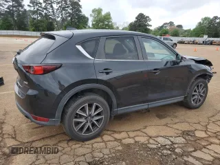2018 Mazda CX-5 Touring with VIN JM3KFACM4J1326270, listed as a Copart auction lot 51731985 with 87,129 mi miles and Salvage Title. Bid and sale history available at carsss.com. Image 3.