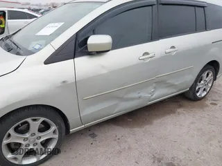 2008 Mazda 5 Sport with VIN JM1CR293080303089, listed as a IAAI auction lot 41434166 with 127,573 mi miles and . Bid and sale history available at carsss.com. Image 6.