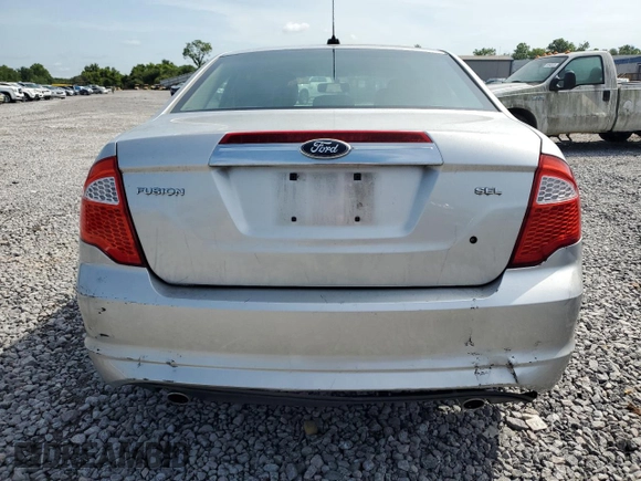 2012 Ford Fusion SEL with VIN 3FAHP0JG9CR157630, listed as a Copart auction lot 61682695 with 154,281 mi miles and Salvage title. Bid and sale history available at DreamBid. Image 6.