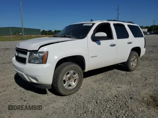 2013 Chevrolet Tahoe LS with VIN 1GNSCAE08DR148078, listed as a Copart auction lot 52948445 with 212,901 mi miles and Salvage title. Bid and sale history available at DreamBid. Image 1.