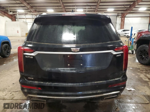 2022 Cadillac XT6 Premium Luxury z VIN 1GYKPDRS3NZ125572, wystawiony jako Copart lot #43626965 z przebiegiem 63 923 mil mil oraz Nie do naprawy • Non repairable. Historia ofert i sprzedaży dostępna na DreamBid. Obrazek 6.