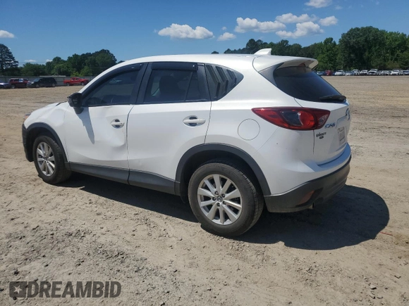 2013 Mazda CX-5 Sport with VIN JM3KE2BE4D0109296, listed as a Copart auction lot 55575555 with 130,112 mi miles and Salvage title. Bid and sale history available at DreamBid. Image 2.