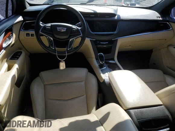 2018 Cadillac XT5 Premium Luxury FWD z VIN 1GYKNERS3JZ139719, wystawiony jako Copart lot #52436595 z przebiegiem Nie podano mil oraz Szkody całkowita. Historia ofert i sprzedaży dostępna na DreamBid. Obrazek 8.