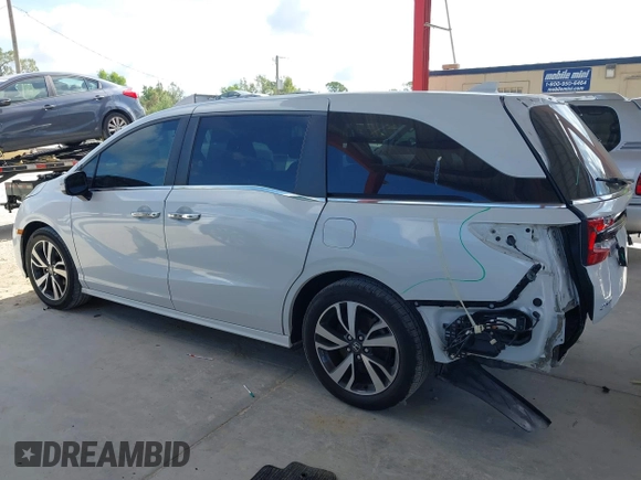 2021 Honda Odyssey Touring z VIN 5FNRL6H80MB003323, wystawiony jako IAAI lot #42303968 z przebiegiem 51 531 mil mil oraz . Historia ofert i sprzedaży dostępna na DreamBid. Obrazek 15.