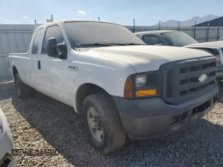 2006 Ford F-350 with VIN 1FTWX30516ED47349, listed as a Copart auction lot 69892384 with 130,444 mi miles and Salvage title. Bid and sale history available at DreamBid. Image 4.