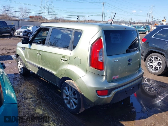 2012 Kia Soul + with VIN KNDJT2A65C7403543, listed as a IAAI auction lot 41633273 with 128,988 mi miles. Bid and sale history available at carsss.com. Image 3.
