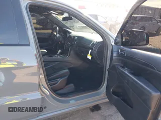 2021 Jeep Grand Cherokee Laredo E with VIN 1C4RJEAG3MC713511, listed as a IAAI auction lot 41235904 with 73,343 mi miles and . Bid and sale history available at DreamBid. Image 5.