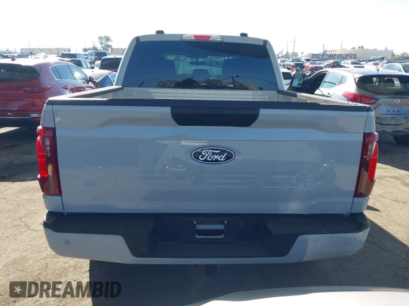 2024 Ford F-150 STX with VIN 1FTEW2KP7RFA29709, listed as a IAAI auction lot 41311395 with 5,883 mi miles and . Bid and sale history available at carsss.com. Image 16.