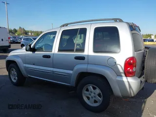 2003 Jeep Liberty Limited z VIN 1J8GL58K73W694818, wystawiony jako IAAI lot #42032227 z przebiegiem 217 446 mil mil oraz . Historia ofert i sprzedaży dostępna na DreamBid. Obrazek 14.