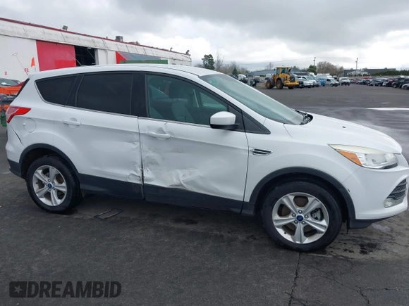 2013 Ford Escape SE with VIN 1FMCU9G93DUA17816, listed as a IAAI auction lot 41688140 with 129,738 mi miles. Bid and sale history available at carsss.com. Image 6.