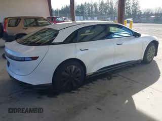 2024 Lucid Air Pure with VIN 50EA1PGA1RA007535, listed as a IAAI auction lot 41879547 with 2,497 mi miles. Bid and sale history available at carsss.com. Image 4.