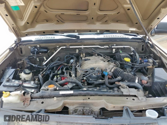2002 Nissan Xterra SE z VIN 5N1ED28YX2C562971, wystawiony jako Copart lot #61462475 z przebiegiem 87 502 mil mil oraz Szkoda całkowita • Salvage title. Historia ofert i sprzedaży dostępna na DreamBid. Obrazek 12.