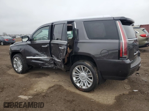 2017 Cadillac Escalade Platinum z VIN 1GYS4DKJ5HR186324, wystawiony jako Copart lot #53880955 z przebiegiem 97 166 mil mil oraz Szkoda całkowita • Salvage title. Historia ofert i sprzedaży dostępna na DreamBid. Obrazek 2.