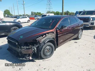 2019 Ford Fusion Hybrid Titanium with VIN 3FA6P0RU2KR123786, listed as a IAAI auction lot 41857026 with 49,604 mi miles. Bid and sale history available at carsss.com. Image 23.