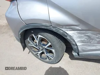 2018 Toyota C-HR XLE z VIN NMTKHMBX5JR009504, wystawiony jako IAAI lot #41776136 z przebiegiem 63 795 mil mil oraz . Historia ofert i sprzedaży dostępna na DreamBid. Obrazek 17.