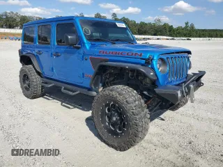 2023 Jeep Wrangler Rubicon with VIN 1C4HJXFN5PW504658, listed as a Copart auction lot 69063484 with 32,490 mi miles and Salvage title. Bid and sale history available at DreamBid. Image 4.