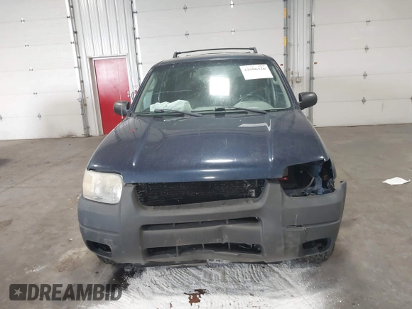 2003 Ford Escape XLT Popular with VIN 1FMYU03103KA06087, listed as a IAAI auction lot 42596326 with 210,441 mi miles and . Bid and sale history available at DreamBid. Image 12.