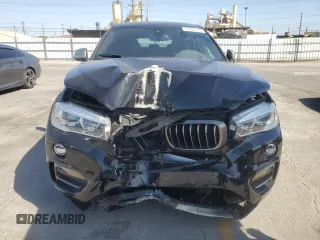 2018 BMW X6 sDrive35i z VIN 5UXKU0C54J0G69704, wystawiony jako Copart lot #57335475 z przebiegiem 61 777 mil mil oraz Szkoda całkowita • Salvage title. Historia ofert i sprzedaży dostępna na DreamBid. Obrazek 5.