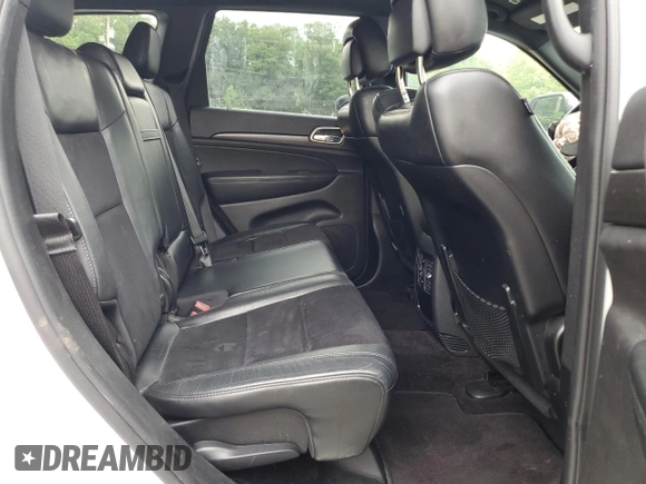 2018 Jeep Grand Cherokee Laredo E with VIN 1C4RJEAGXJC430096, listed as a Copart auction lot 57391405 with 89,248 mi miles and Salvage title. Bid and sale history available at DreamBid. Image 11.