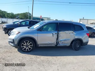 2019 Honda Pilot Elite with VIN 5FNYF6H00KB001016, listed as a IAAI auction lot 42583325 with 133,327 mi miles and . Bid and sale history available at DreamBid. Image 14.
