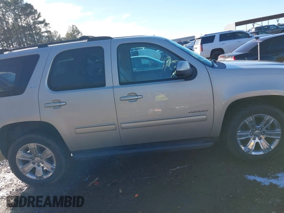 2014 GMC Yukon SLT with VIN 1GKS1CE03ER115330, listed as a IAAI auction lot 41346200 with 115,010 mi miles. Bid and sale history available at carsss.com. Image 14.