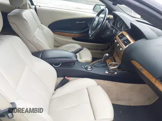 2007 BMW 6 Series 650i z VIN WBAEK13567CN83841, wystawiony jako IAAI lot #42380370 z przebiegiem 106 792 mil mil oraz . Historia ofert i sprzedaży dostępna na DreamBid. Obrazek 5.