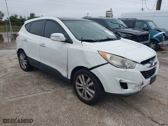 2013 Hyundai Tucson GLS with VIN KM8JU3AC8DU599937, listed as a IAAI auction lot 41398687 with 207,048 mi miles. Bid and sale history available at carsss.com. Image 1.
