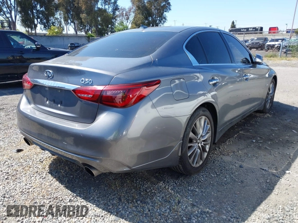 2019 Infiniti Q50 3.0t LUXE with VIN JN1EV7AP5KM519569, listed as a IAAI auction lot 42078137 with 134,486 mi miles. Bid and sale history available at carsss.com. Image 4.