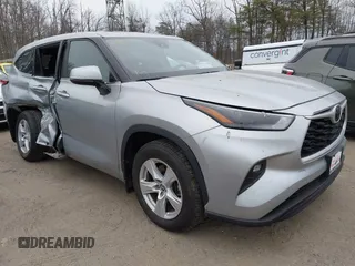 2023 Toyota Highlander L z VIN 5TDKDRBH2PS015689, wystawiony jako IAAI lot #41721597 z przebiegiem 62 860 mil mil oraz . Historia ofert i sprzedaży dostępna na DreamBid. Obrazek 1.