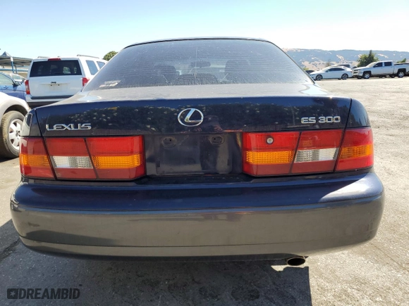 1998 Lexus ES 300 Luxury Sport Sdn with VIN JT8BF28G5W5016080, listed as a Copart auction lot 61466314 with 223,793 mi miles and Salvage Title. Bid and sale history available at carsss.com. Image 6.