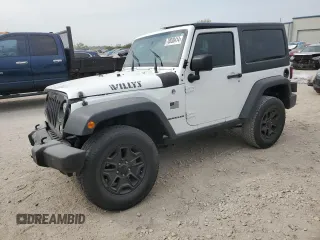 2016 Jeep Wrangler Willys Wheeler z VIN 1C4AJWAG7GL297695, wystawiony jako Copart lot #70838414 z przebiegiem 82 813 mil mil oraz Szkoda całkowita • Salvage title. Historia ofert i sprzedaży dostępna na DreamBid. Obrazek 1.