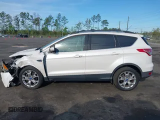 2013 Ford Escape SEL with VIN 1FMCU9H99DUA97959, listed as a IAAI auction lot 41879967 with 149,456 mi miles. Bid and sale history available at carsss.com. Image 14.