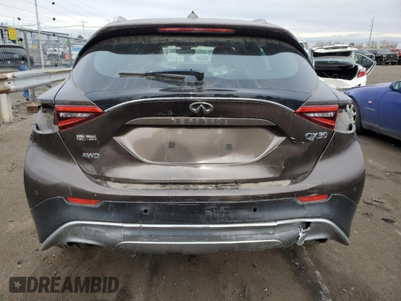 2017 Infiniti QX30 Luxury z VIN SJKCH5CR5HA036055, wystawiony jako Copart lot #79571703 z przebiegiem 47 152 mil mil oraz Szkoda całkowita • Salvage title. Historia ofert i sprzedaży dostępna na DreamBid. Obrazek 6.