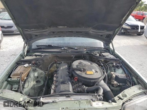 1989 Mercedes-Benz 300 with VIN WDBCA24D0KA457759, listed as a Copart auction lot 47920625 with 174,332 mi miles and Salvage Title. Bid and sale history available at DreamBid. Image 11.
