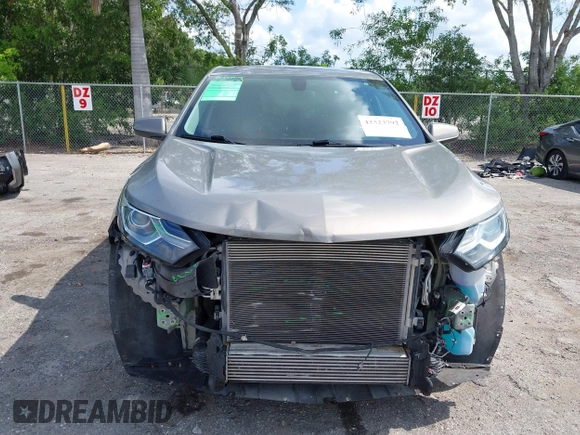 2019 Chevrolet Equinox LT z VIN 3GNAXKEVXKS586516, wystawiony jako IAAI lot #42323792 z przebiegiem 53 710 mil mil oraz . Historia ofert i sprzedaży dostępna na DreamBid. Obrazek 13.