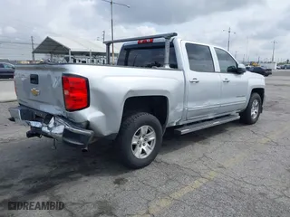 2016 Chevrolet Silverado 1500 LT with VIN 3GCPCREC7GG174263, listed as a IAAI auction lot 41891688 with 265,362 mi miles. Bid and sale history available at carsss.com. Image 4.