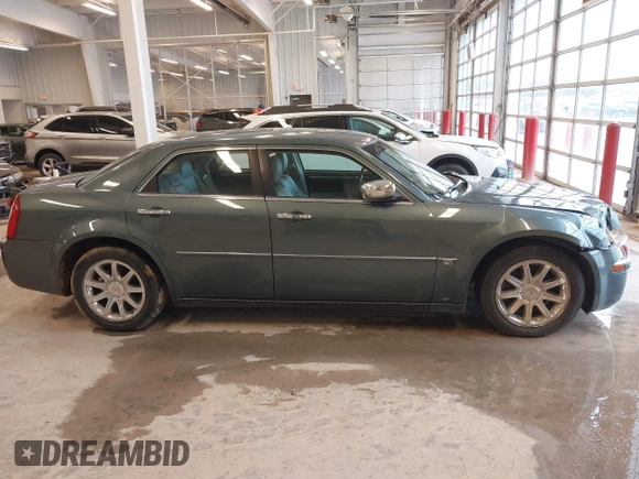 2005 Chrysler 300 with VIN 2C3JA63H95H111269, listed as a IAAI auction lot 41717805 with 102,740 mi miles. Bid and sale history available at carsss.com. Image 13.