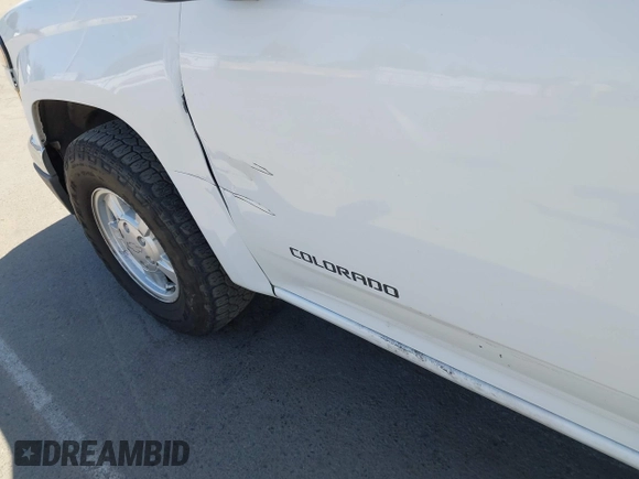 2005 Chevrolet Colorado LS Z85 z VIN 1GCCS146458251947, wystawiony jako IAAI lot #42527497 z przebiegiem 177 207 mil mil oraz . Historia ofert i sprzedaży dostępna na DreamBid. Obrazek 12.