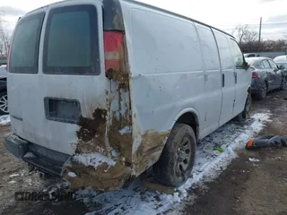 2010 Chevrolet Express Cargo Van with VIN 1GCUGADX6A1154119, listed as a IAAI auction lot 41608254 with 156,816 mi miles. Bid and sale history available at carsss.com. Image 4.