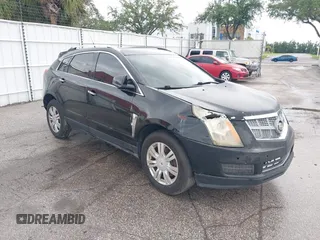 2012 Cadillac SRX Luxury Collection z VIN 3GYFNAE39CS505319, wystawiony jako IAAI lot #42240143 z przebiegiem 215 376 mil mil oraz . Historia ofert i sprzedaży dostępna na DreamBid. Obrazek 1.