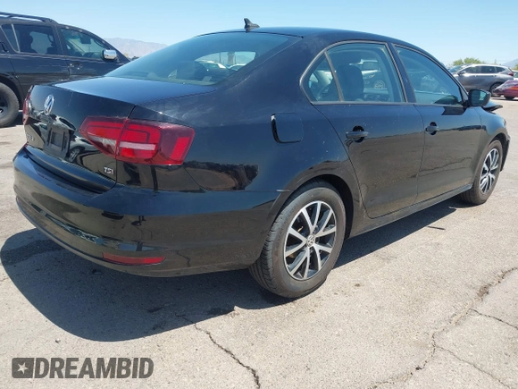 2016 Volkswagen Jetta Sedan 1.4T SE with VIN 3VWD67AJ8GM368642, listed as a IAAI auction lot 42087079 with 90,974 mi miles. Bid and sale history available at carsss.com. Image 4.