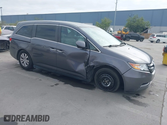 2016 Honda Odyssey EX-L with VIN 5FNRL5H68GB104350, listed as a IAAI auction lot 42023306 with 124,672 mi miles. Bid and sale history available at carsss.com. Image 1.