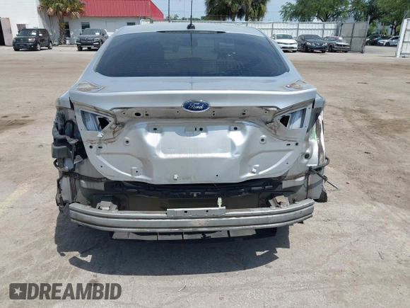 2014 Ford Fusion Titanium with VIN 3FA6P0K99ER358244, listed as a IAAI auction lot 42085703 with 194,626 mi miles. Bid and sale history available at carsss.com. Image 6.