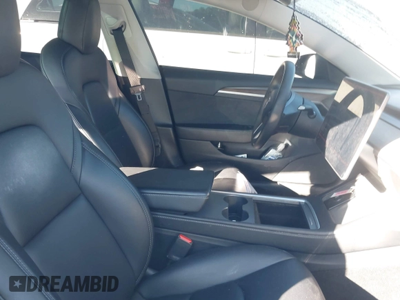2022 Tesla Model 3 with VIN 5YJ3E1EA9NF147836, listed as a IAAI auction lot 41363603 with 28,748 mi miles. Bid and sale history available at carsss.com. Image 5.
