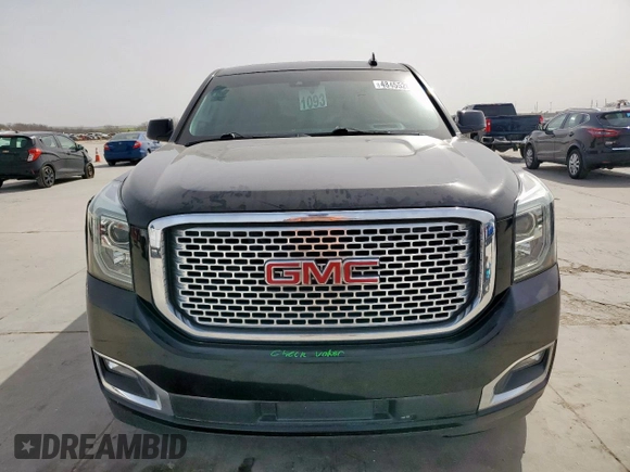 2015 GMC Yukon Denali with VIN 1GKS2CKJ2FR580533, listed as a Copart auction lot 48455205 with 147,532 mi miles and Salvage Title. Bid and sale history available at carsss.com. Image 5.
