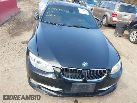 2013 BMW 3 Series 335i with VIN WBADX7C52DJ590132, listed as a IAAI auction lot 41486602 with 154,984 mi miles and . Bid and sale history available at DreamBid. Image 12.