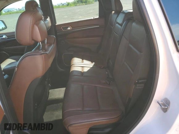 2015 Jeep Grand Cherokee Summit with VIN 1C4RJFJM3FC731831, listed as a Copart auction lot 66570534 with 230,193 mi miles and Clean title. Bid and sale history available at DreamBid. Image 10.